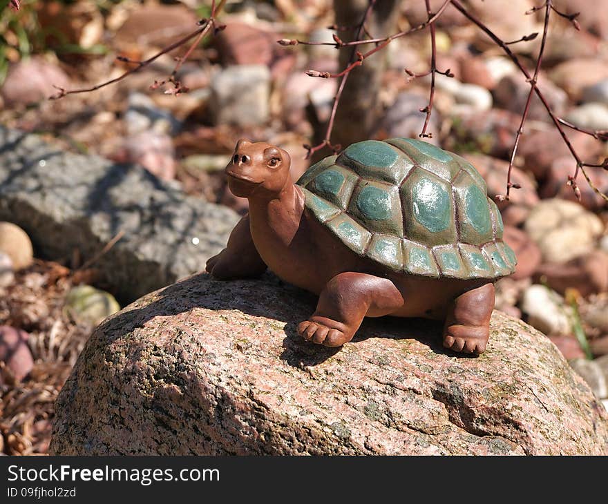 Stone turtle statue in a garden