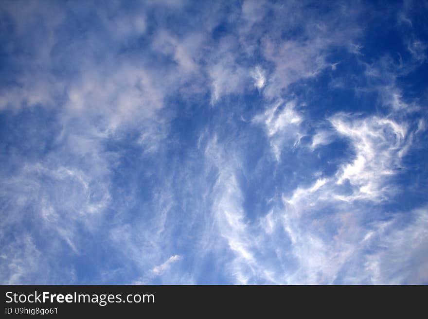 Sign of heart in the sky made by clouds