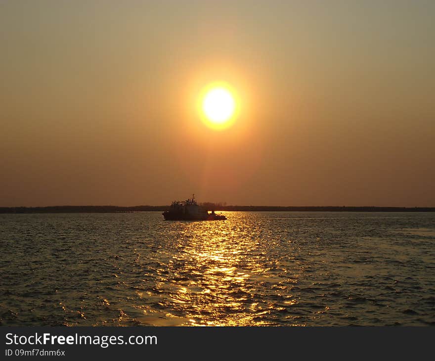 Riverboat on the vast expanse of the river. Riverboat on the vast expanse of the river.