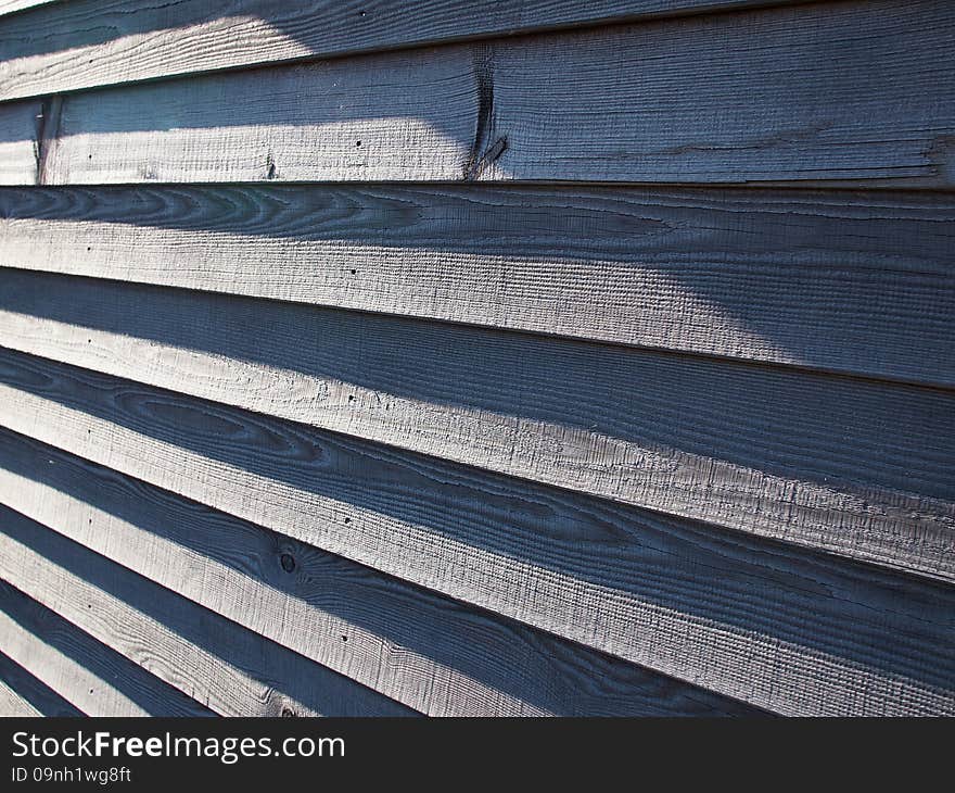 Wood wall siding in closeup view perspective angle