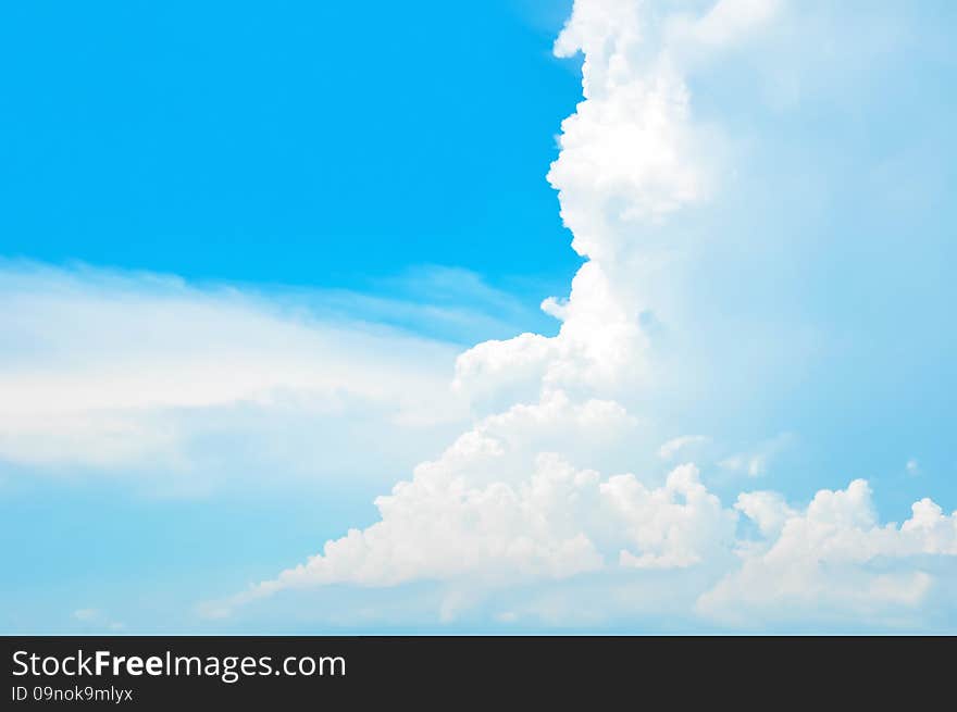 Bright summer blue sky and clouds as background