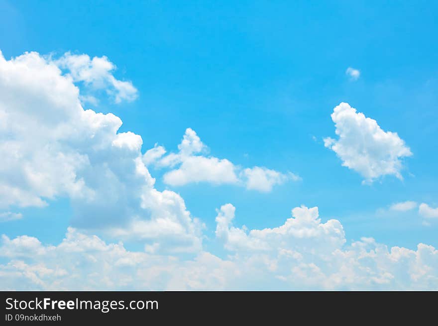 Beautiful bright summer blue sky and clouds as background