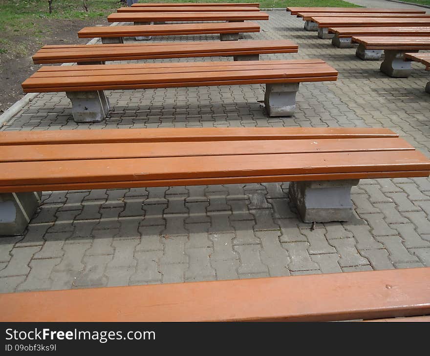 Benches together standing in a row seating. Benches together standing in a row seating.