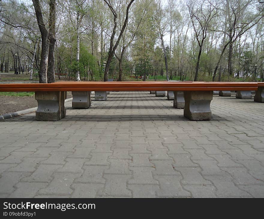 Benches together standing in a row seating. Benches together standing in a row seating.