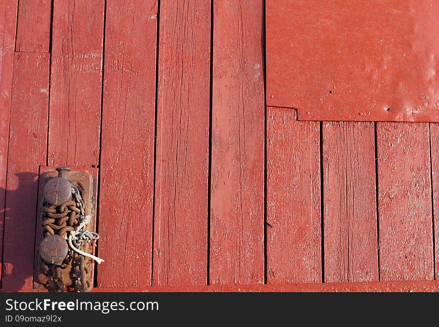 Painted old wooden wall. red background. Painted old wooden wall. red background