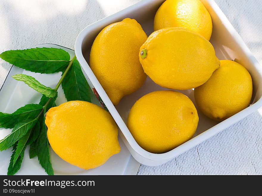 Fresh lemon and a sprig of mint