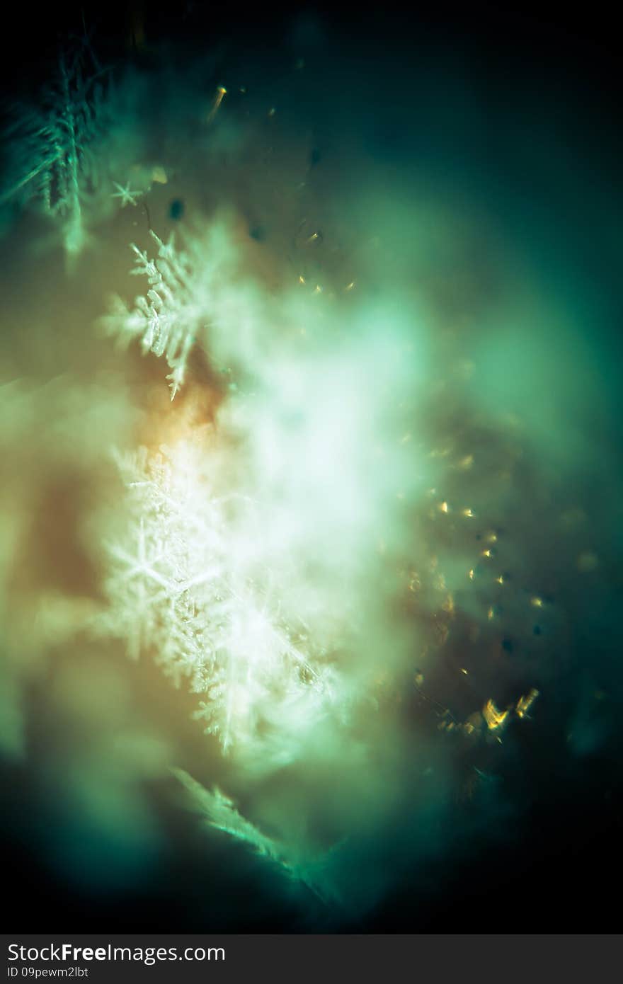 Extremely close up image of snowflakes, vintage photo effect. Extremely close up image of snowflakes, vintage photo effect.