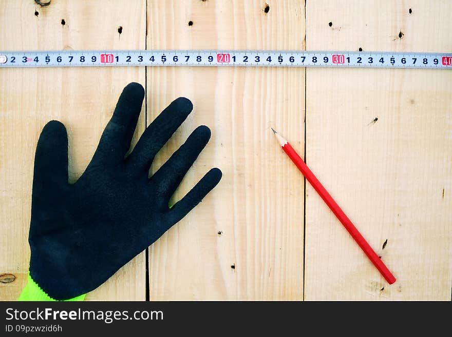 measuring wood planks