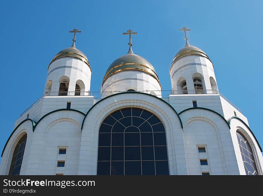 Three domes of the temple of white marble. bottom view