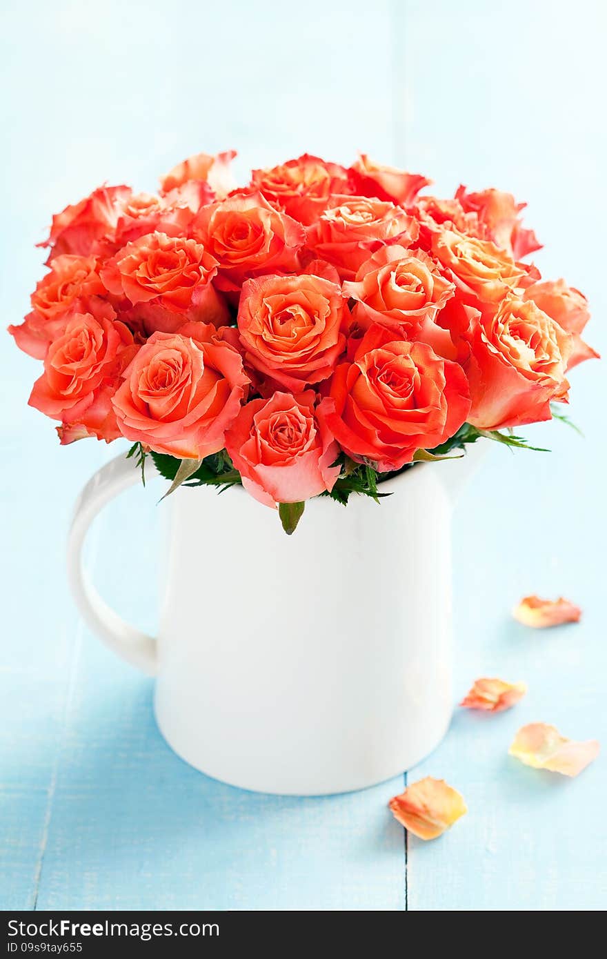 Bouquet of roses in a cup, selective focus