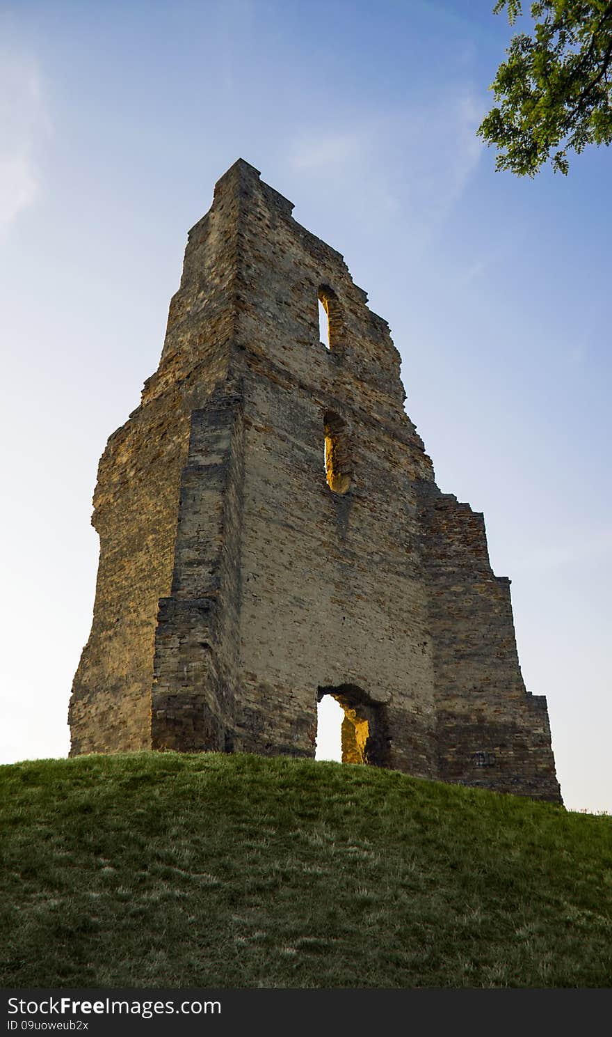 Church ruin on hill at sunrise