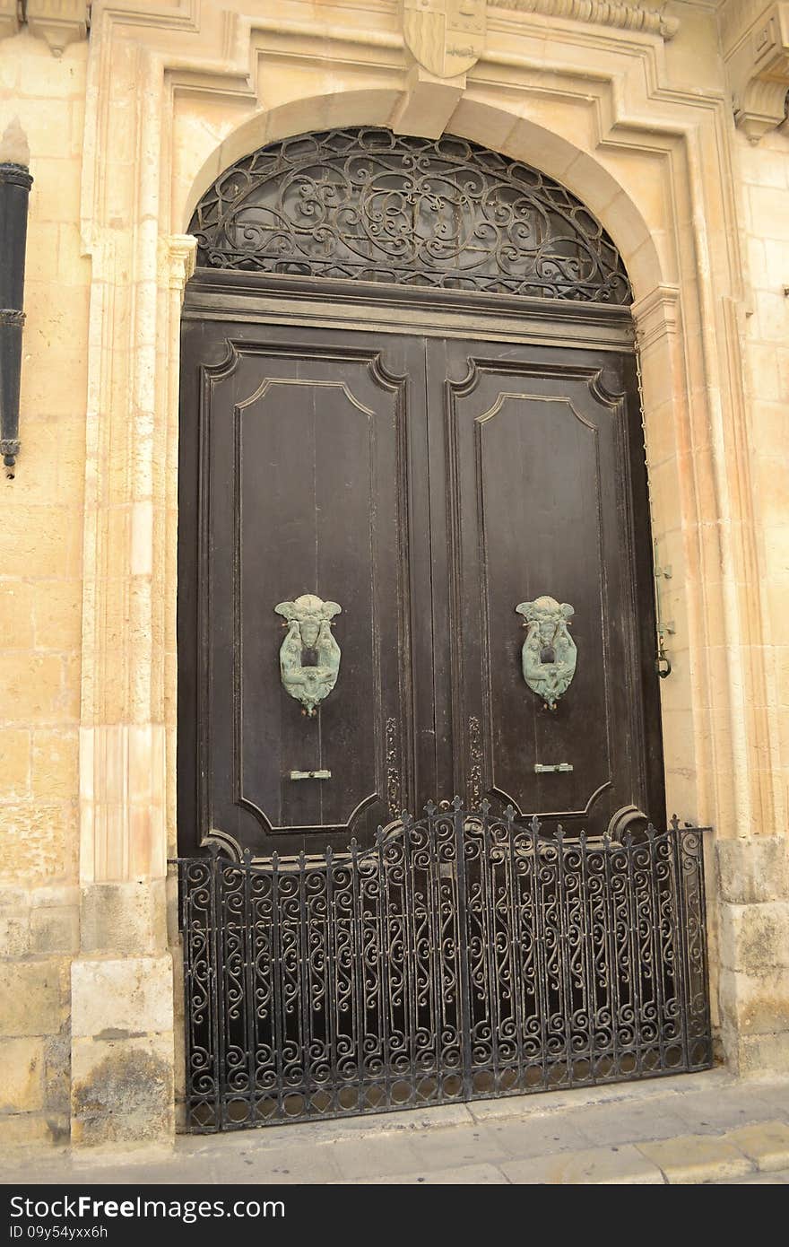 Antique door of a building in the classical style. Antique door of a building in the classical style