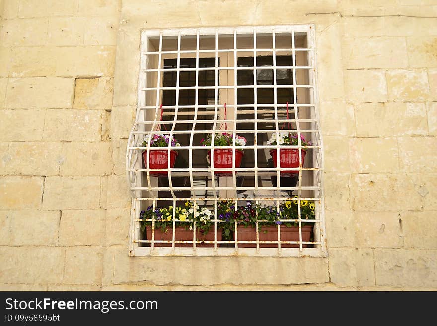 Ancient windows and balconies of a building in the classical style