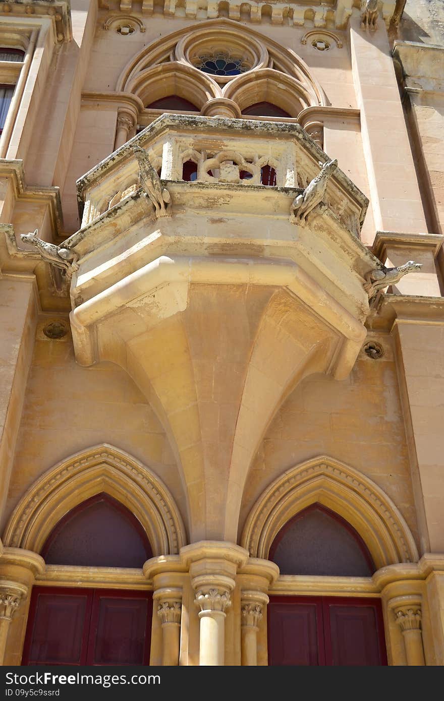 Ancient windows and balconies of a building in the classical style