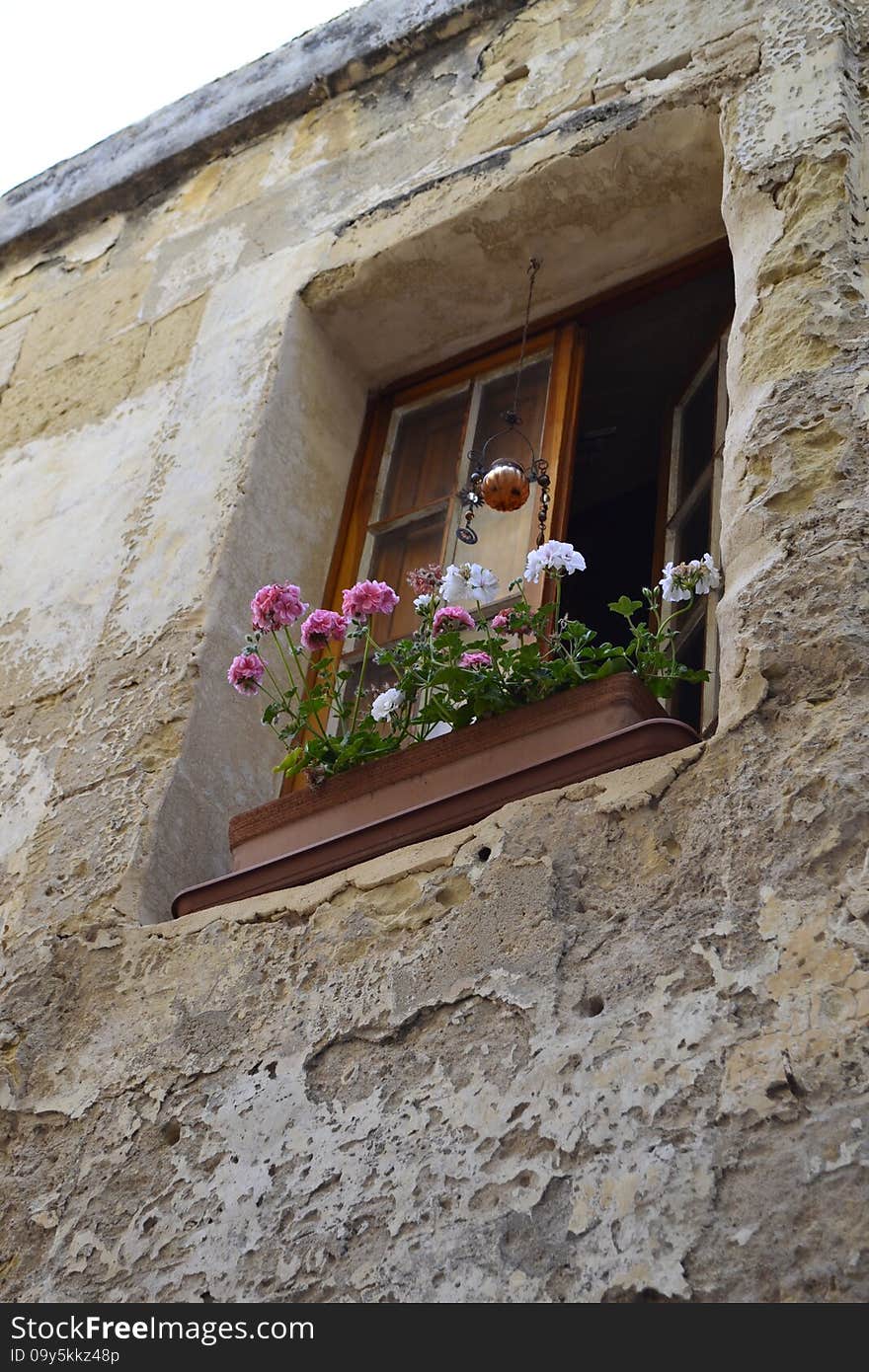 Ancient windows and balconies of a building in the classical style