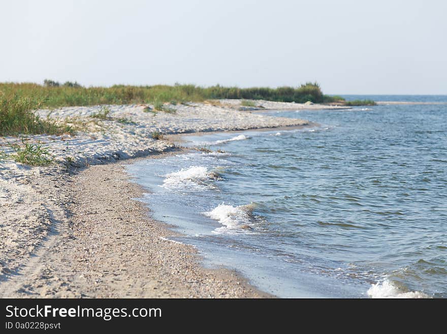 Deserted seascape in summer morning light