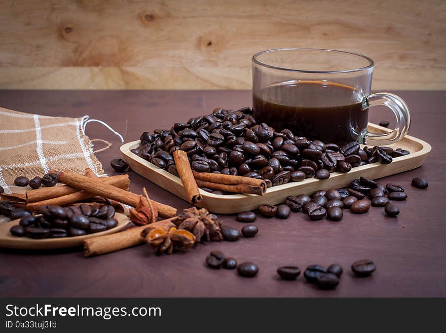 Coffee on grunge wooden background.