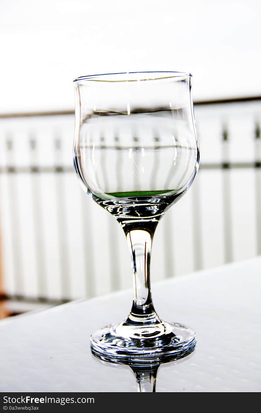 Empty glass and sea view. Empty glass and sea view