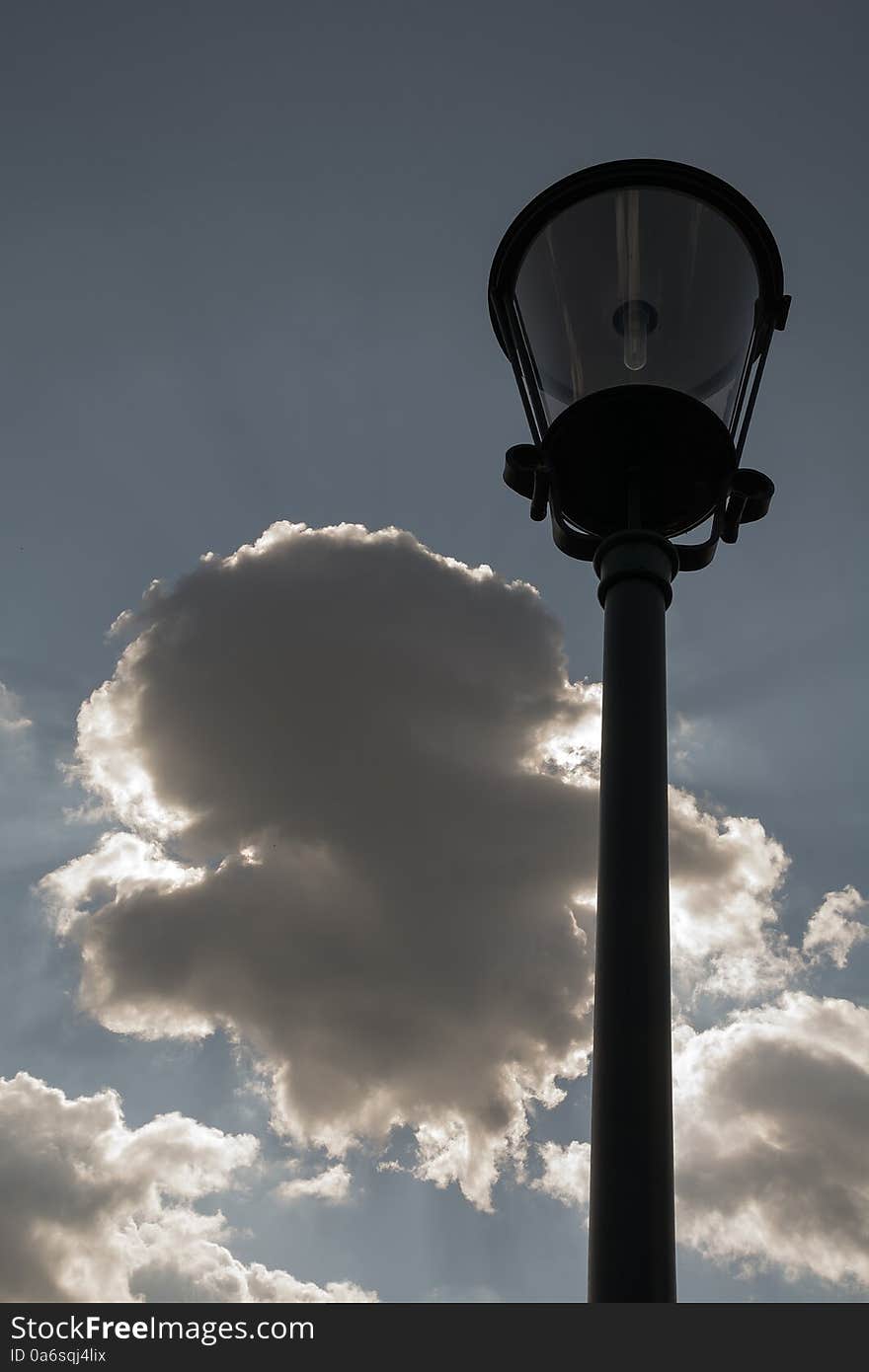 Street lamp on the sky background