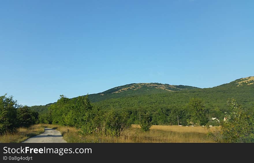 Old rural road and mountain views. Old rural road and mountain views