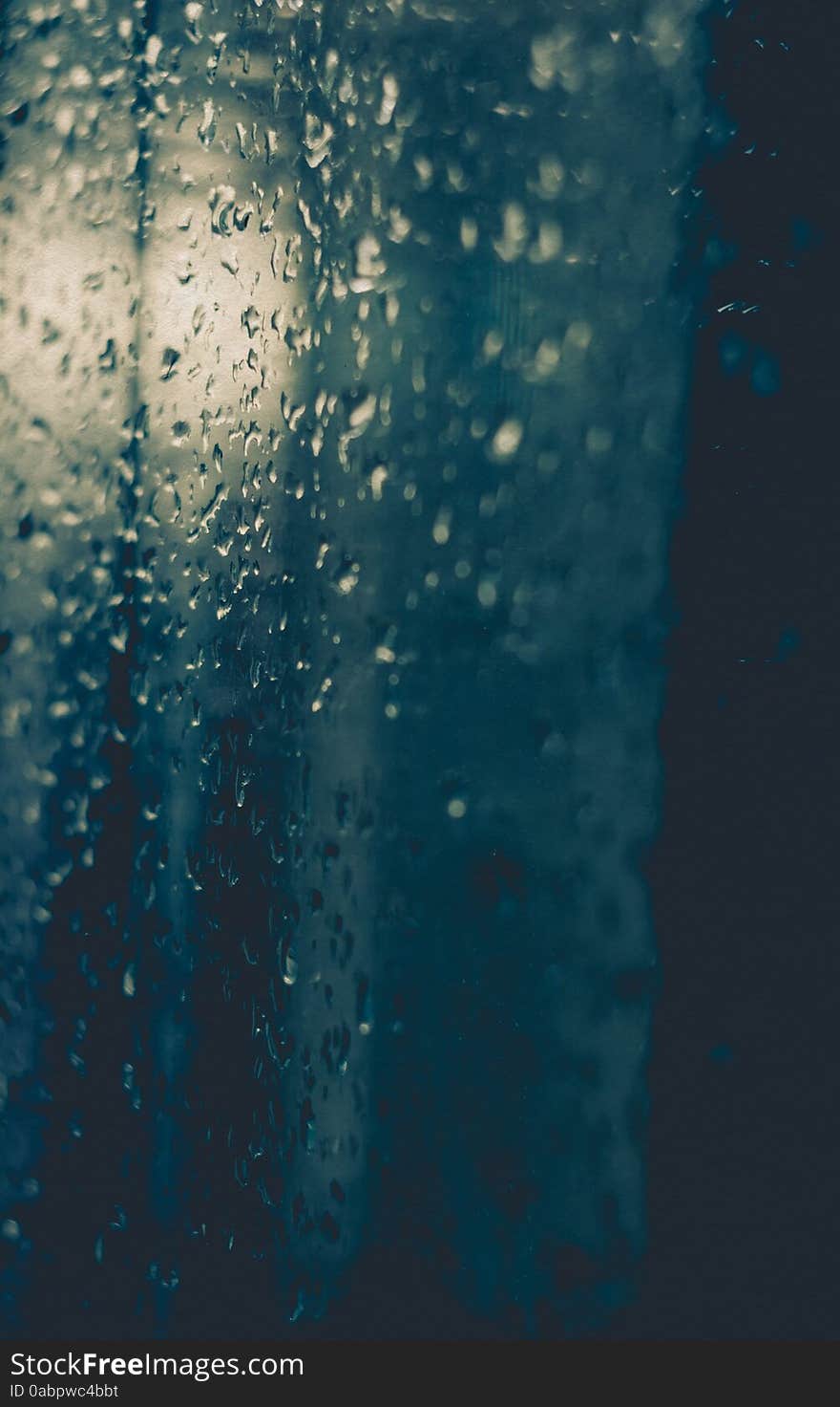 Water drops on window, shallow focus, vintage photo effect with paper texture. Water drops on window, shallow focus, vintage photo effect with paper texture.