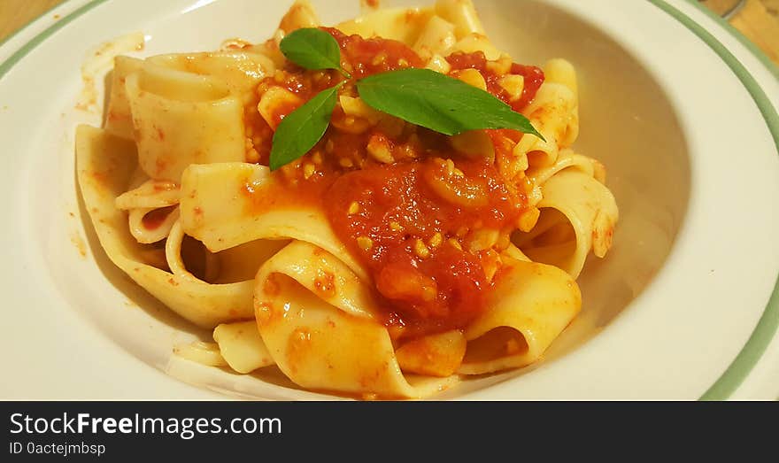 Italian pasta fettuccine with tomatoes sauce. Italian pasta fettuccine with tomatoes sauce