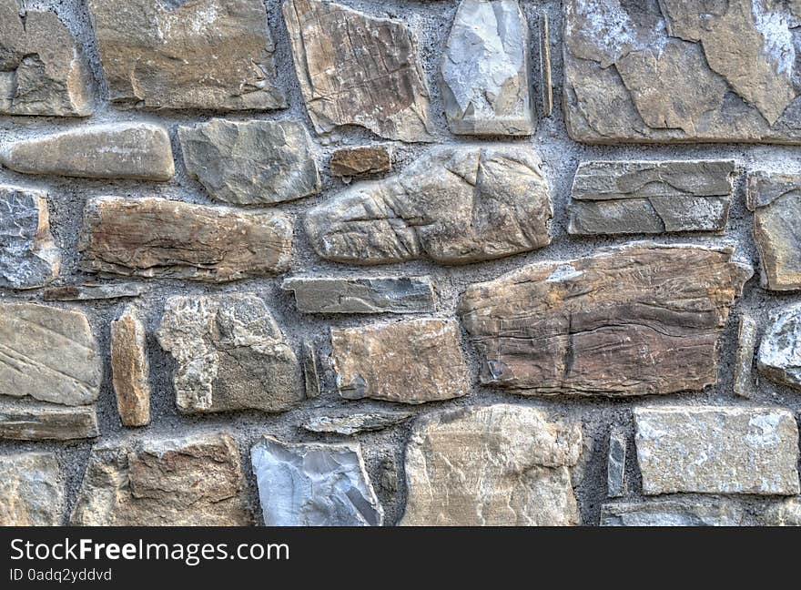 Stone wall background closeup view