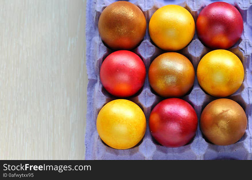 Colourful painted Easter eggs in neat rows Legear