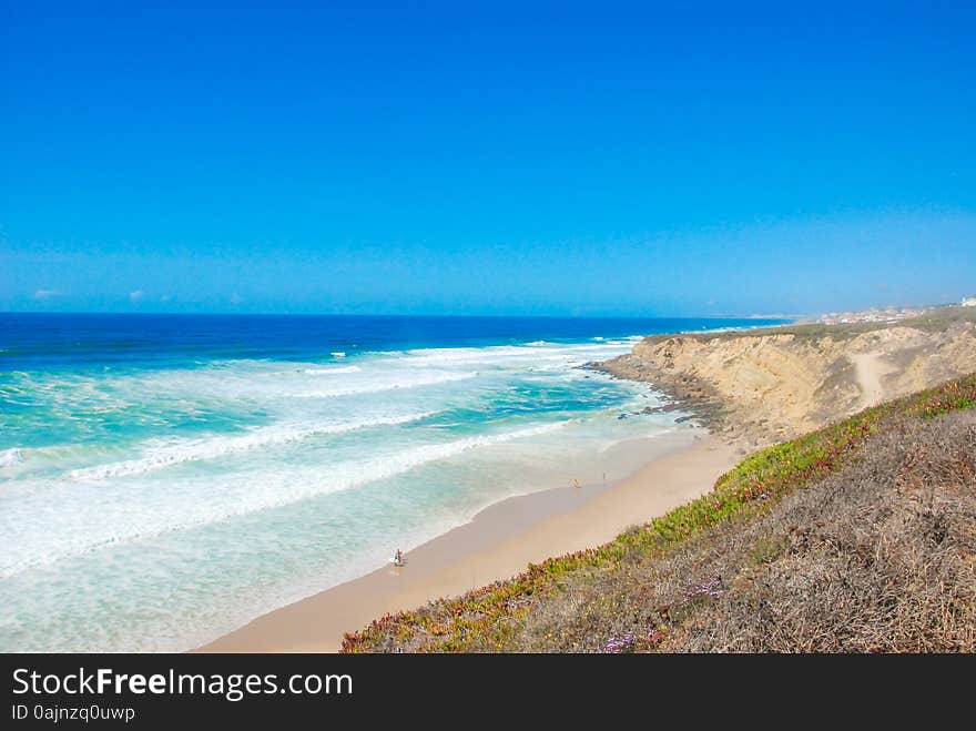 A Beautiful picture of a beach in portugal. A Beautiful picture of a beach in portugal.