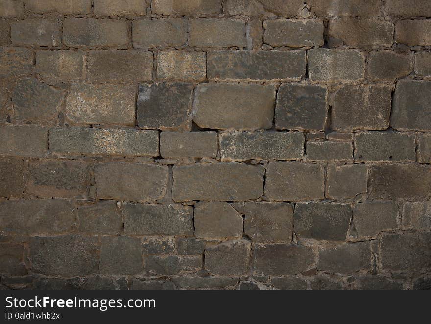 Texture of old brick, stone wall.