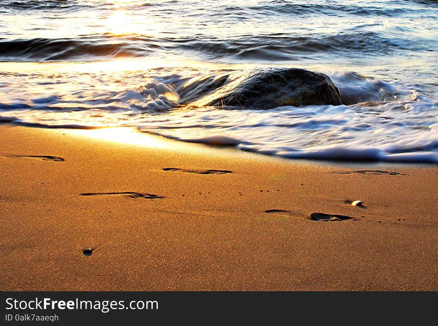 The sunset on the beach - romantic place