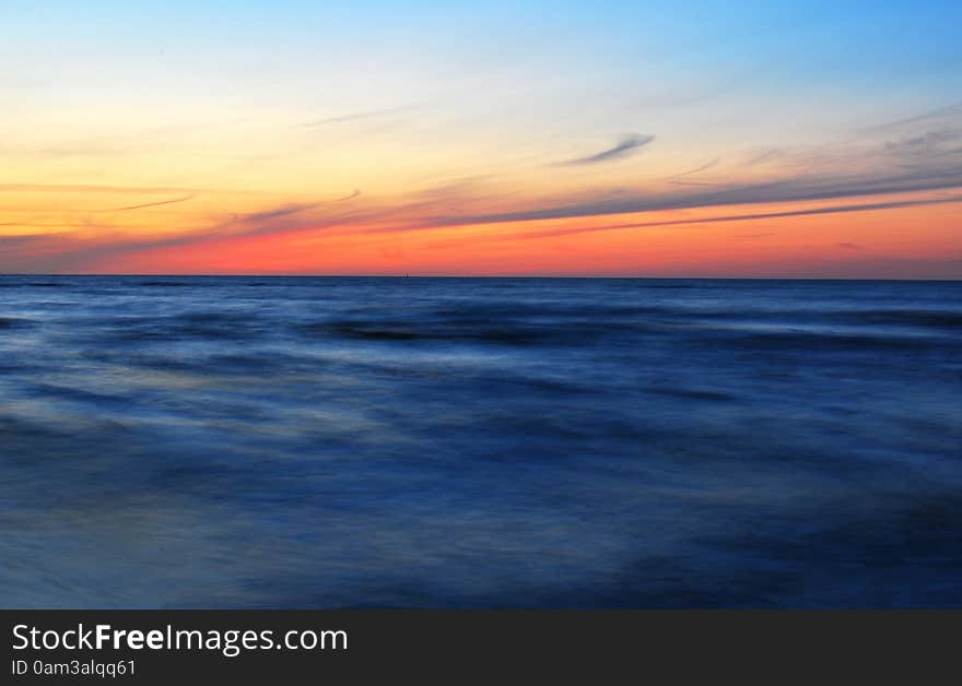 The sunset on the beach - romantic place