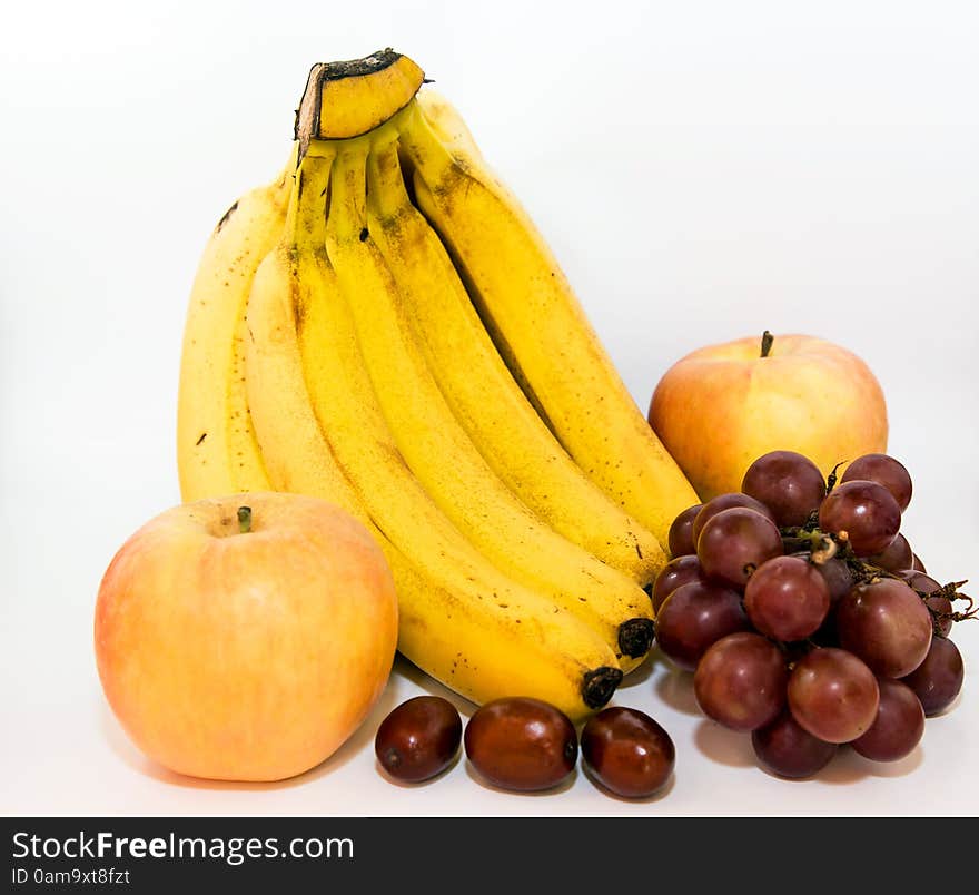 Bananas apples grapes and dates