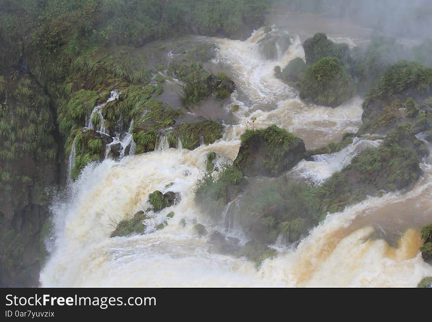 Iguazu falls are waterfalls of the Iguazu River on the border of the Argentine province of Misiones and the Brazilian state of ParanÃ¡. Surroned by rainforest with amazing flora and fauna. Iguazu falls are waterfalls of the Iguazu River on the border of the Argentine province of Misiones and the Brazilian state of ParanÃ¡. Surroned by rainforest with amazing flora and fauna.