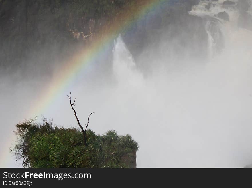 Iguazu falls are waterfalls of the Iguazu River on the border of the Argentine province of Misiones and the Brazilian state of ParanÃ¡. Surroned by rainforest with amazing flora and fauna. Iguazu falls are waterfalls of the Iguazu River on the border of the Argentine province of Misiones and the Brazilian state of ParanÃ¡. Surroned by rainforest with amazing flora and fauna.