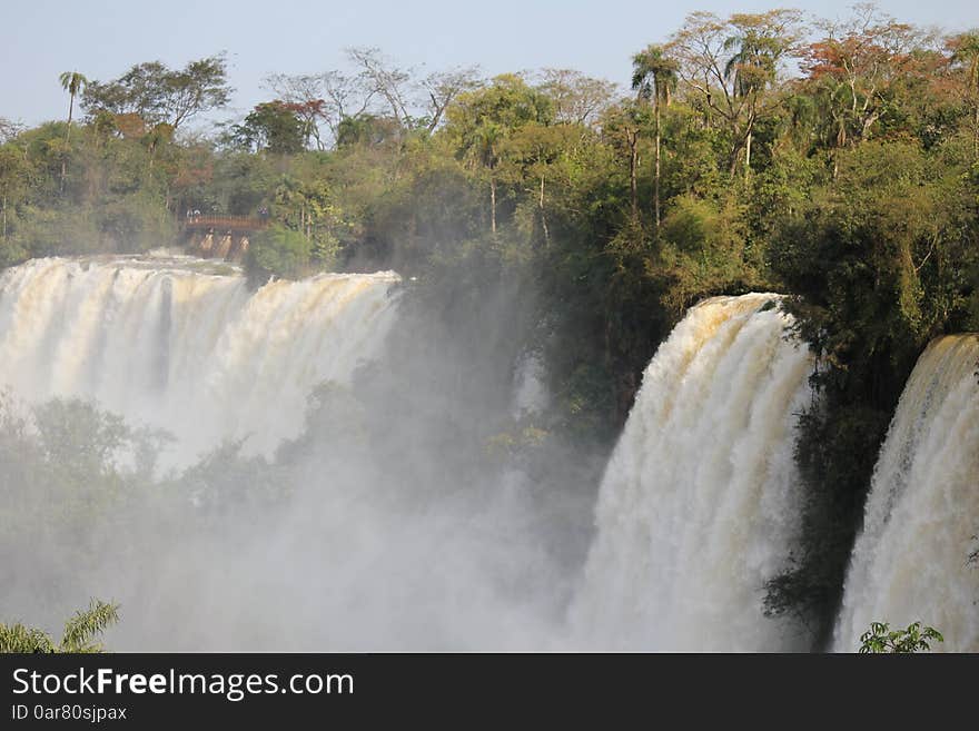 Iguazu falls are waterfalls of the Iguazu River on the border of the Argentine province of Misiones and the Brazilian state of ParanÃ¡. Surroned by rainforest with amazing flora and fauna. Iguazu falls are waterfalls of the Iguazu River on the border of the Argentine province of Misiones and the Brazilian state of ParanÃ¡. Surroned by rainforest with amazing flora and fauna.