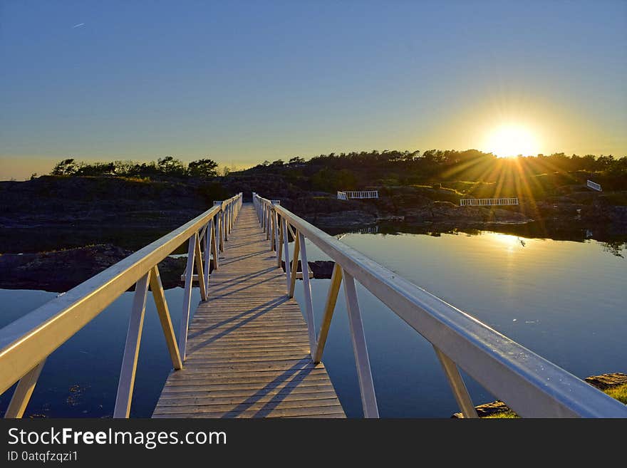 White Bridge Illuminated By Sunset