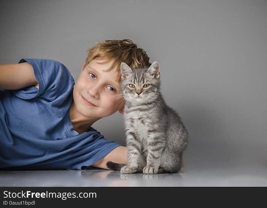 Happy Boy With Little Kitten