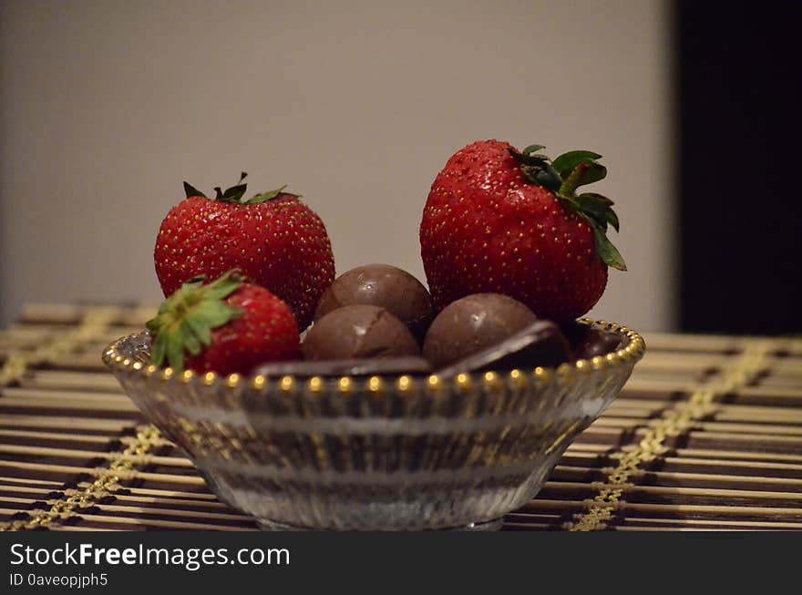 Chocolate and strawberries, sweet desert on a plate.