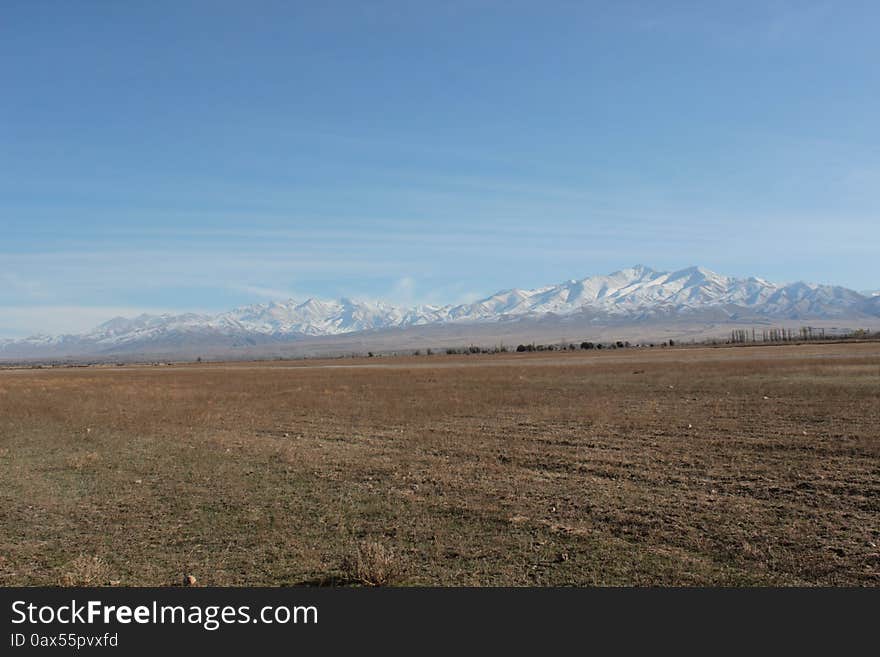 A view of the mountains in the Talas region of Kyrgyzstan. A mountainous, undeveloped and remote region of Kyrgyzstan. A view of the mountains in the Talas region of Kyrgyzstan. A mountainous, undeveloped and remote region of Kyrgyzstan.