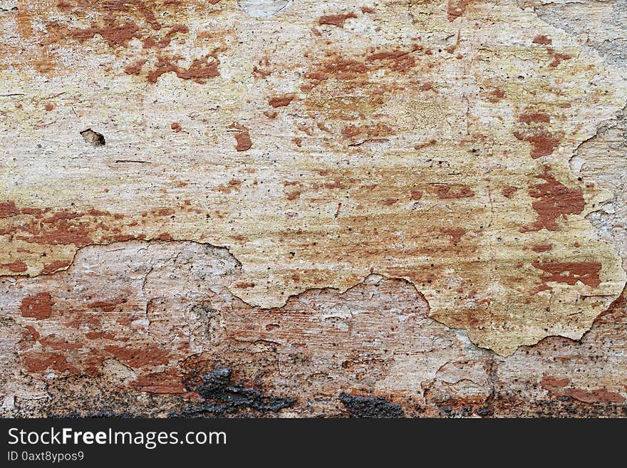 A grunge texture of old red wall