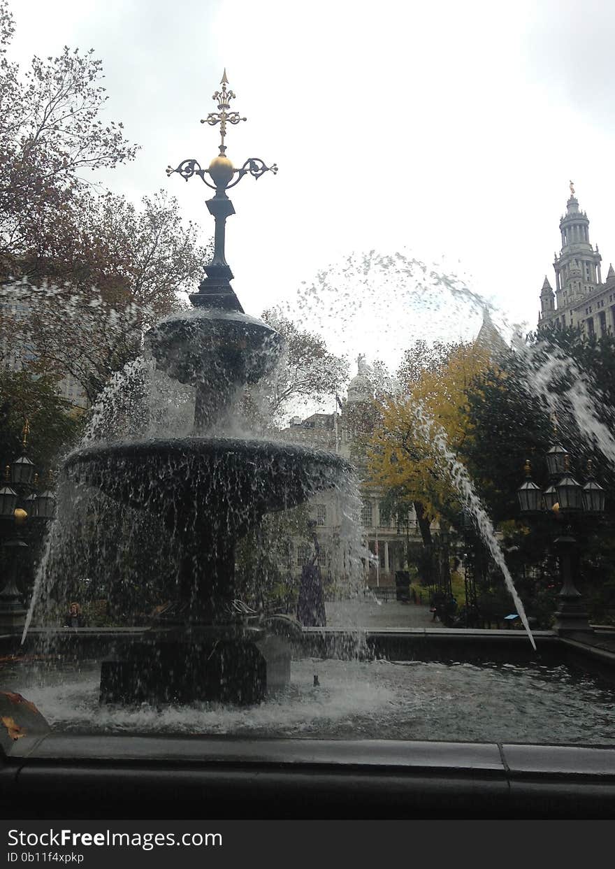 A Fountain in front of New York City Hall Building.