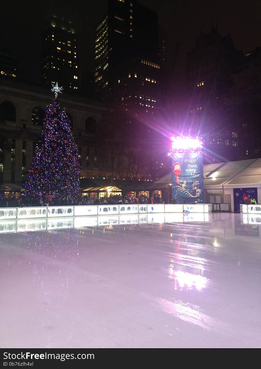 Ice Skating Rink at Bryant Park in the Evening in Manhattan, New York, NY. Ice Skating Rink at Bryant Park in the Evening in Manhattan, New York, NY.