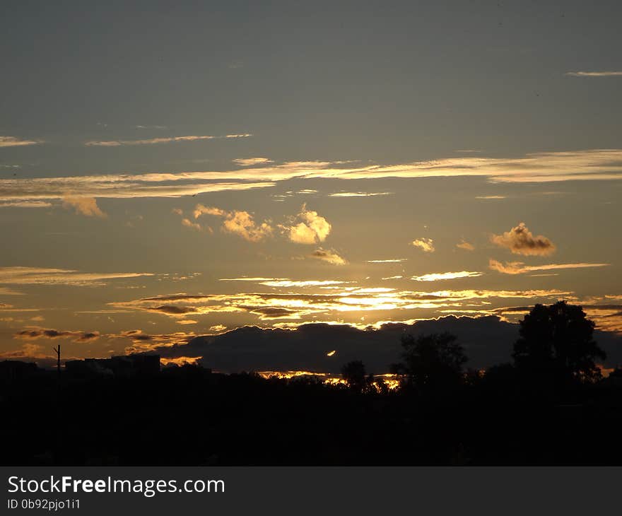 Beautful yellow sunset in a summer evening