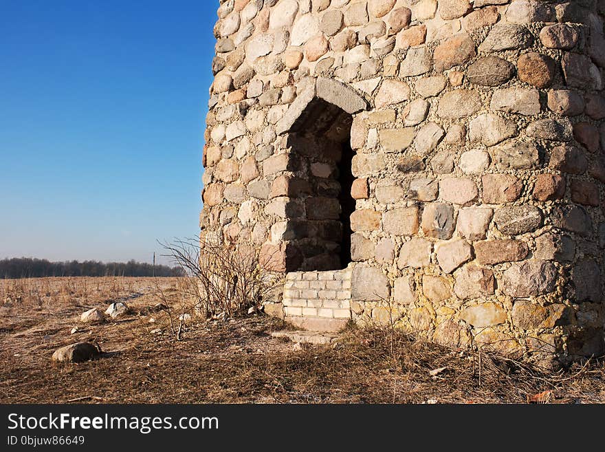 Detail of old watchtower on sunny day closeup