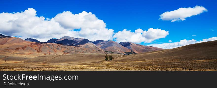 Prairie landscape with mountains panorama