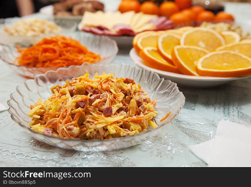 Crab salad on a plate on the festive table