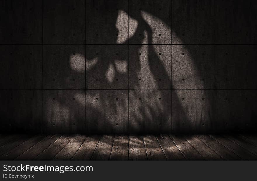 Scary dark underground room with walls made of concrete and wooden floors. Scary dark underground room with walls made of concrete and wooden floors