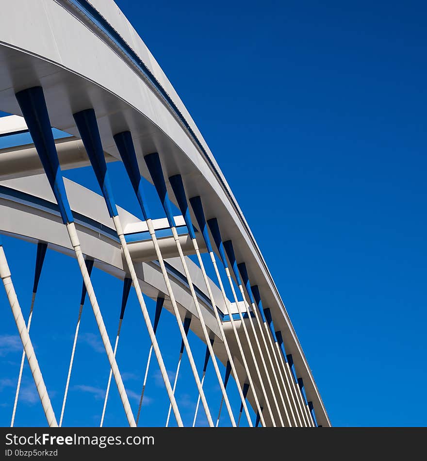 Detail of the Apollo Bridge in Bratislava on blue sky background