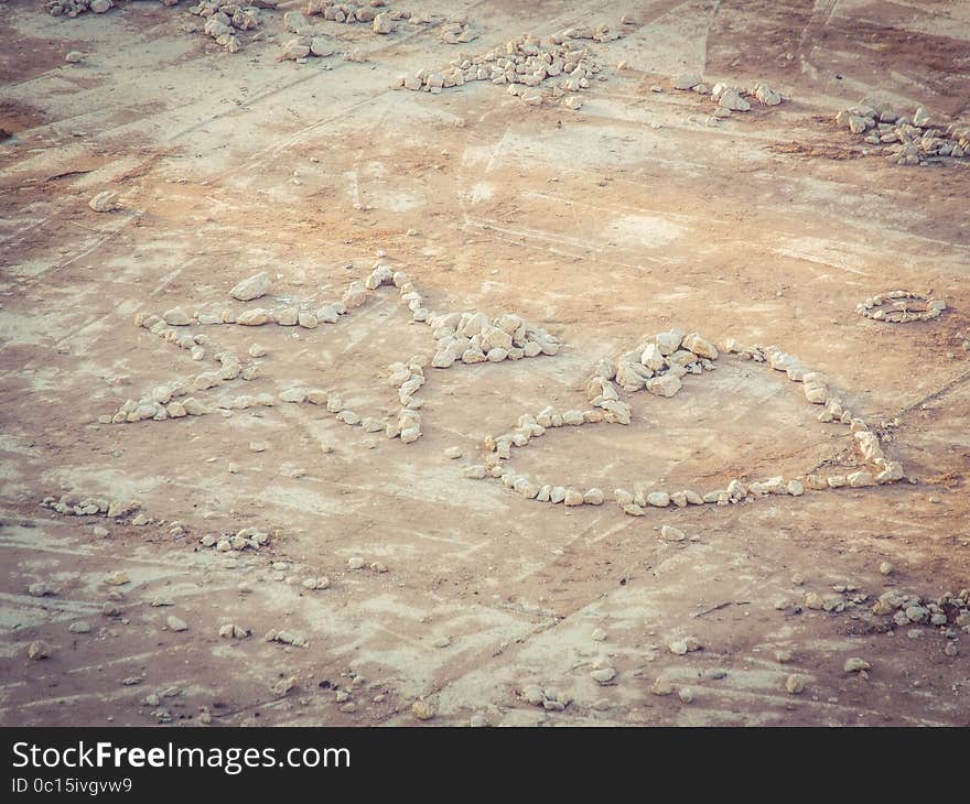 Beautiful image with group of pebles in a heart shape concept. Beautiful image with group of pebles in a heart shape concept